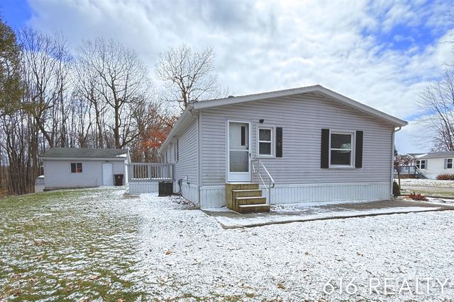 7358 Willow Wood Drive, Belmont, MI 49306