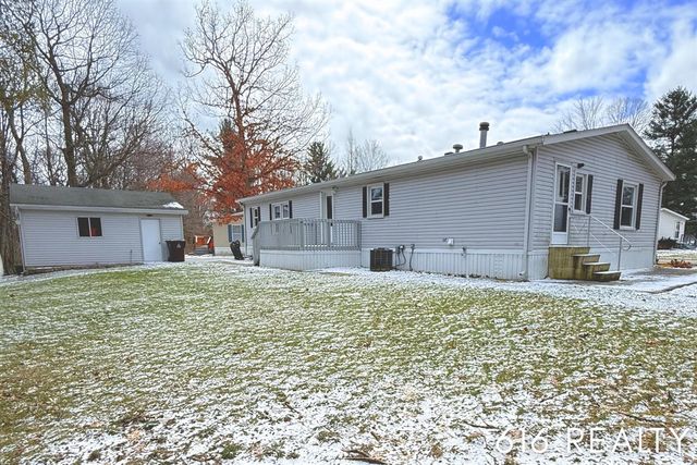 7358 Willow Wood Drive, Belmont, MI 49306