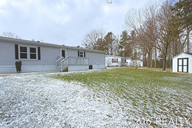 7358 Willow Wood Drive, Belmont, MI 49306