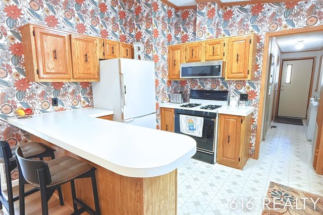 7358 Willow Wood Drive, Belmont, MI 49306