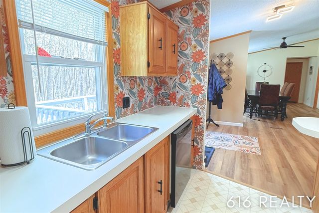 7358 Willow Wood Drive, Belmont, MI 49306