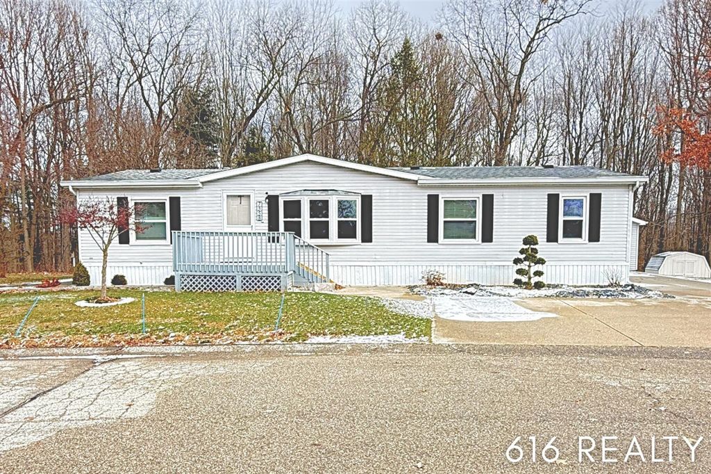 7358 Willow Wood Drive, Belmont, MI 49306