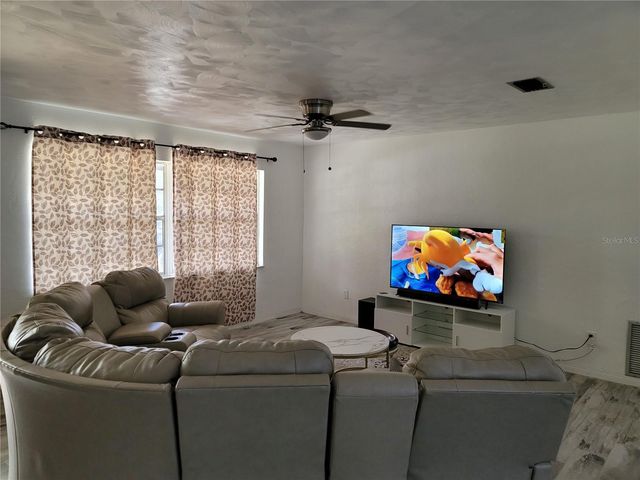 1670 TIFFIN AVENUE, Deltona, FL 32725