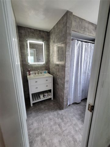 1670 TIFFIN AVENUE, Deltona, FL 32725