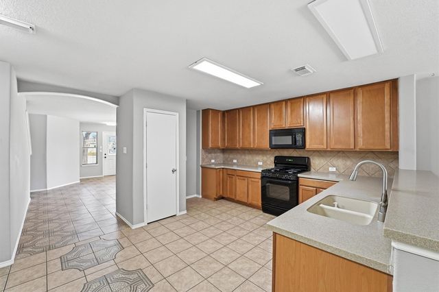 2038 Adobe Stone Drive, Humble, TX 77396