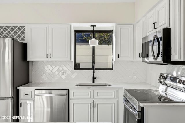 2170 THE WOODS Drive E, Jacksonville, FL 32246