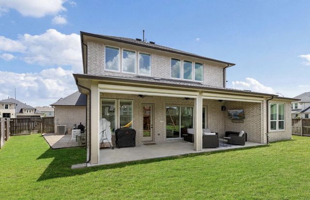 25003 Stela Falls Lane, Tomball, TX 77375