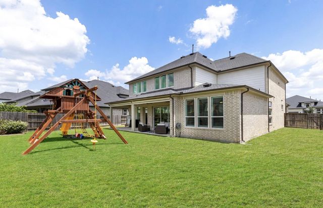 25003 Stela Falls Lane, Tomball, TX 77375