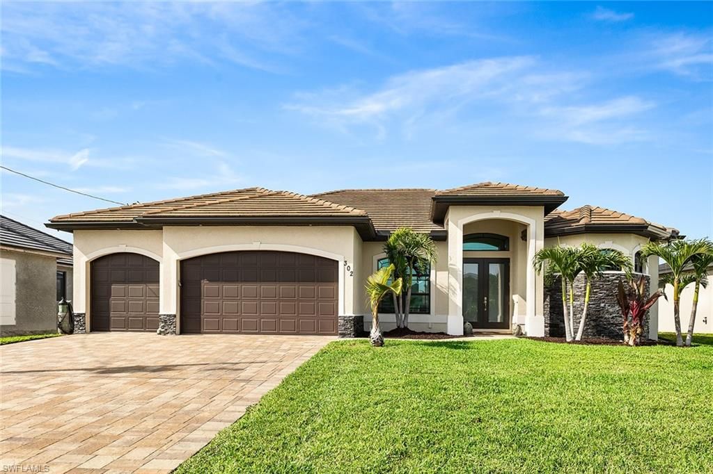 302 NW 32nd PL, CAPE CORAL, FL 33993 — photo 4