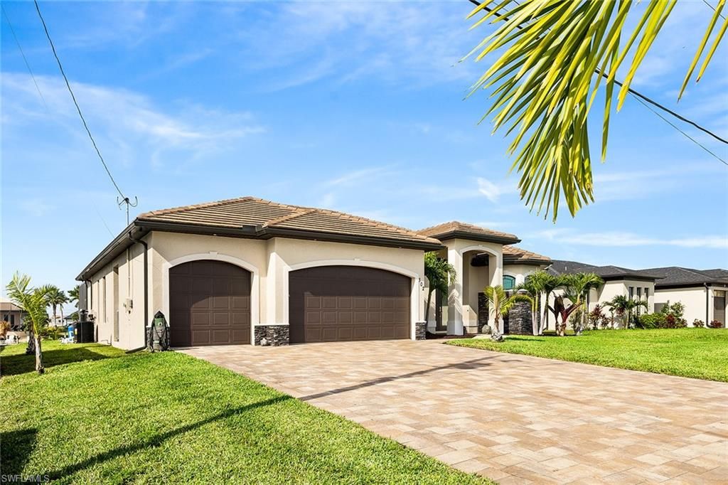 302 NW 32nd PL, CAPE CORAL, FL 33993 — photo 5