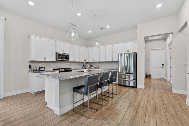 8427 W Blue Spring Drive, Parkland, FL 33067