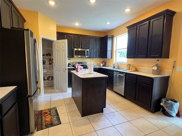 2642 MAGGIORE CIRCLE, Kissimmee, FL 34746