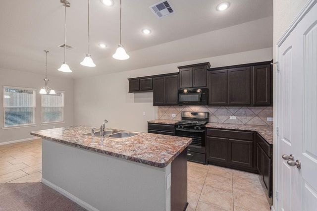 12153 Goliad Lane, Willis, TX 77378