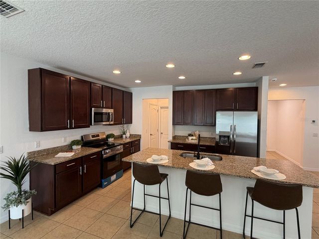 15311 SCORPIO STREET, Mascotte, FL 34753
