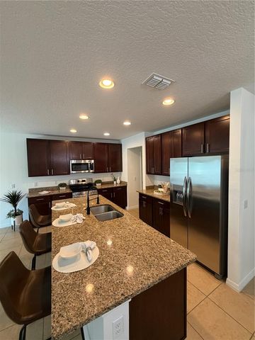 15311 SCORPIO STREET, Mascotte, FL 34753