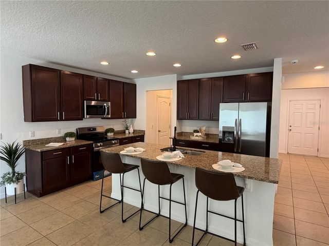 15311 SCORPIO STREET, Mascotte, FL 34753