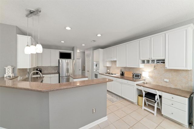 127 Hawknest Court, The Woodlands, TX 77384