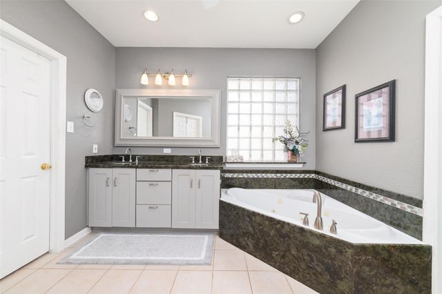 127 Hawknest Court, The Woodlands, TX 77384