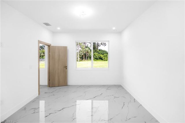 718 Robert AVE, Lehigh Acres, FL 33936