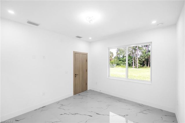 718 Robert AVE, Lehigh Acres, FL 33936