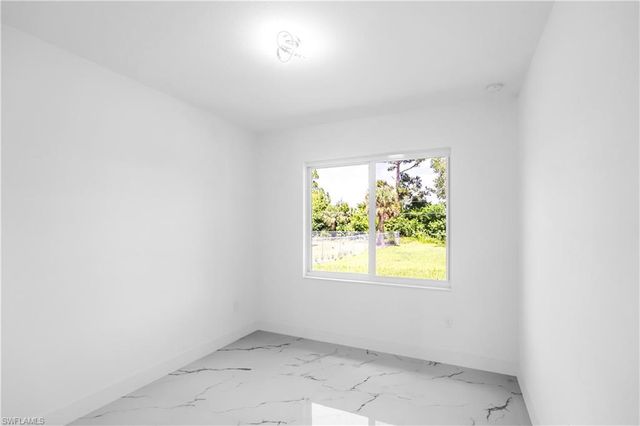 718 Robert AVE, Lehigh Acres, FL 33936