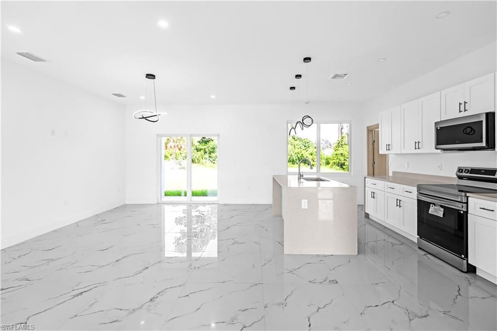 718 Robert AVE, LEHIGH ACRES, FL 33936 — photo 3