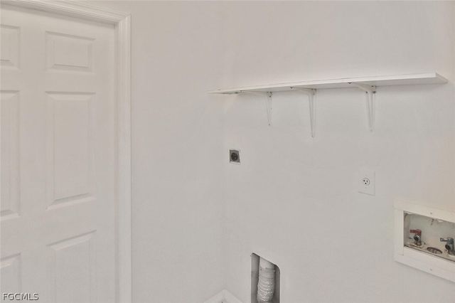 530 Peerless CIR, Lehigh Acres, FL 33974