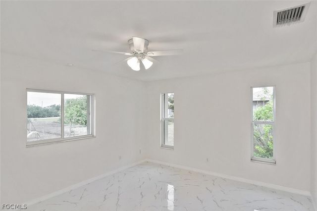 530 Peerless CIR, Lehigh Acres, FL 33974