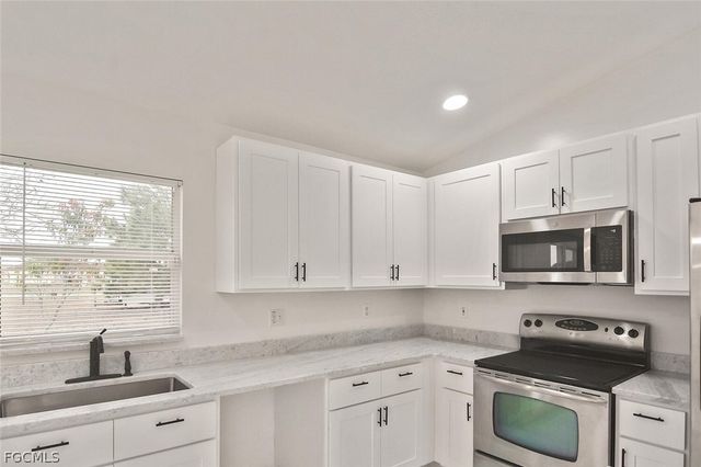 530 Peerless CIR, Lehigh Acres, FL 33974