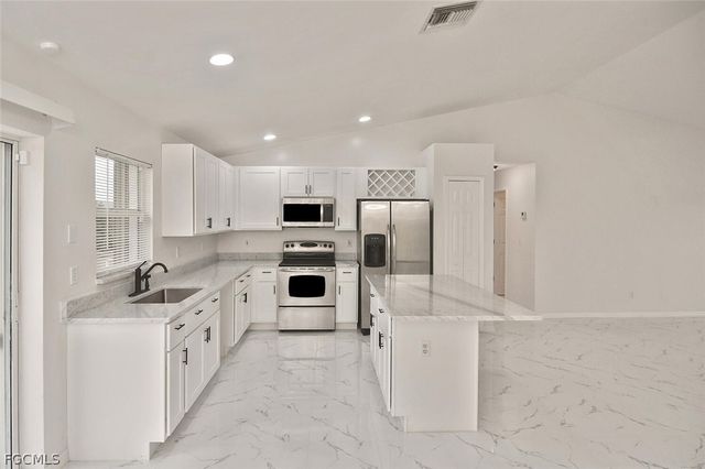 530 Peerless CIR, Lehigh Acres, FL 33974