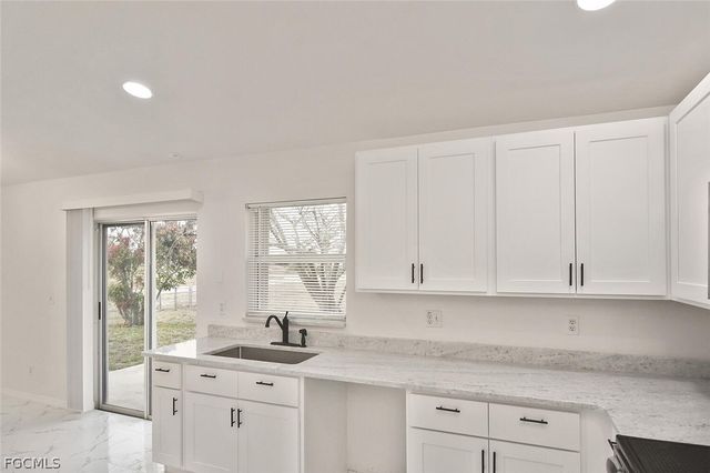 530 Peerless CIR, Lehigh Acres, FL 33974