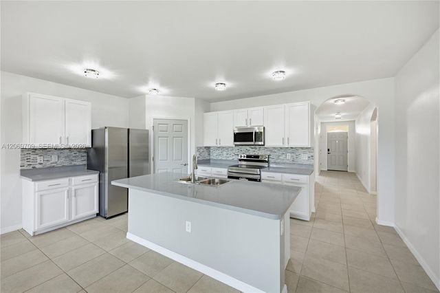 10288 Silver Pond Lane, Lehigh Acres, FL 33936