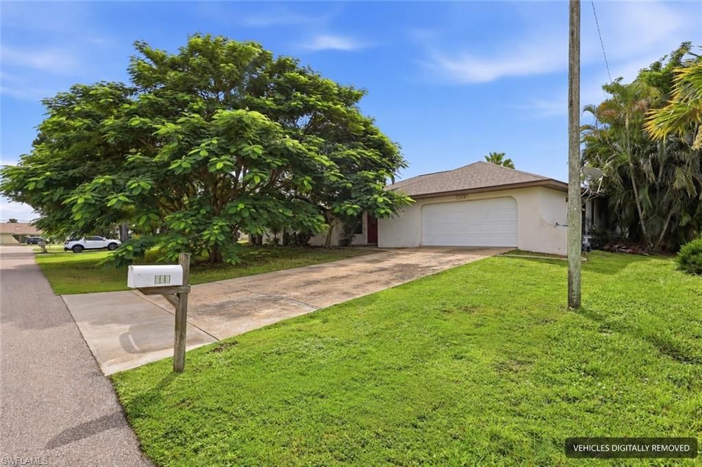 Image 1 of property listing at 338 46th LN, Cape Coral, FL 33904