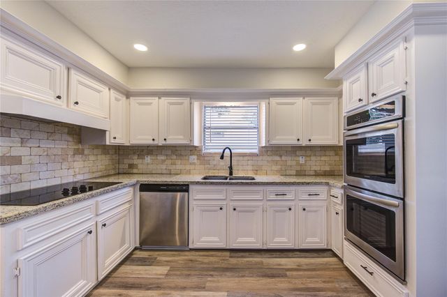 9115 Taidswood Drive, Spring, TX 77379