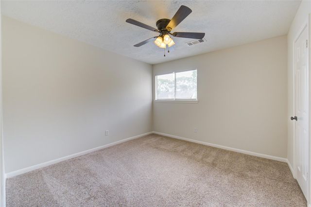 9115 Taidswood Drive, Spring, TX 77379