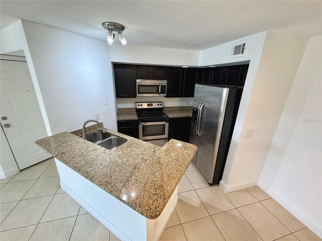 4532 COMMANDER DRIVE 2128, Orlando, FL 32822