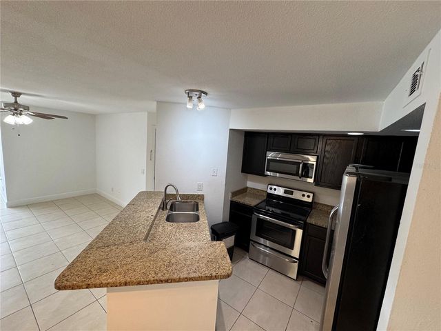 4532 COMMANDER DRIVE 2128, Orlando, FL 32822
