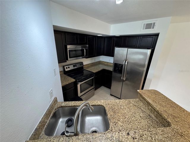 4532 COMMANDER DRIVE 2128, Orlando, FL 32822