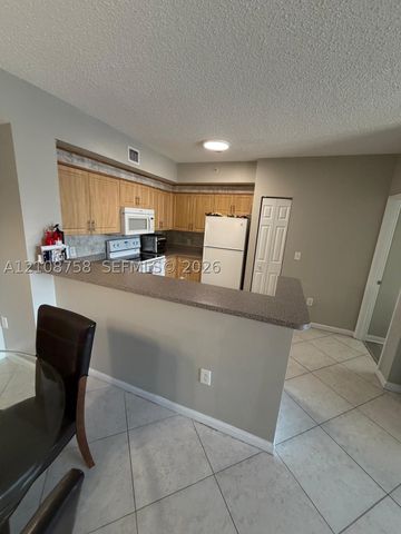 7980 N Nob Hill Rd 204, Tamarac, FL 33321