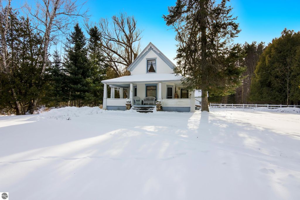 Image 1 of property listing at 5349 Grass River Road, Bellaire, MI 49615