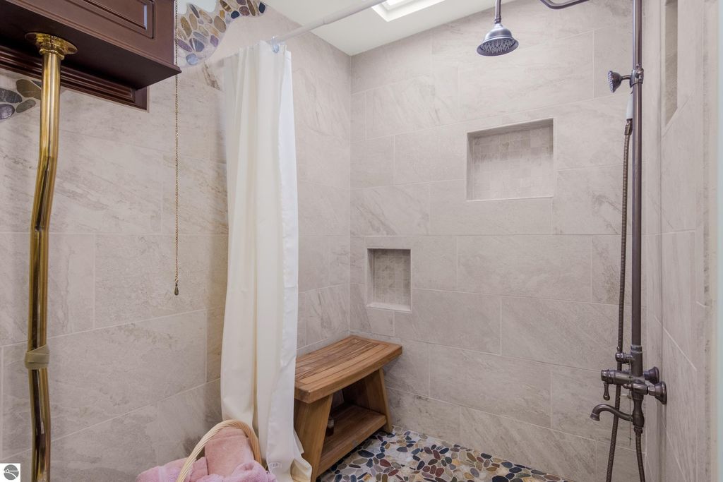 Image 25 of property listing at 5349 Grass River Road, Bellaire, MI 49615