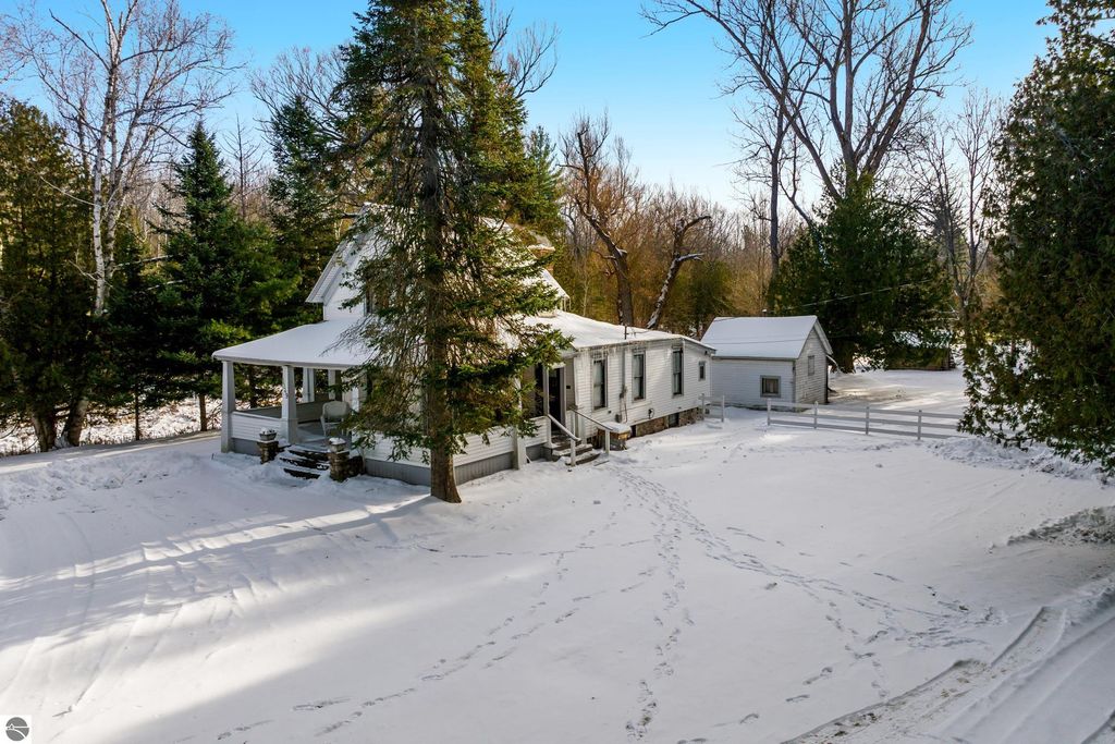Image 3 of property listing at 5349 Grass River Road, Bellaire, MI 49615