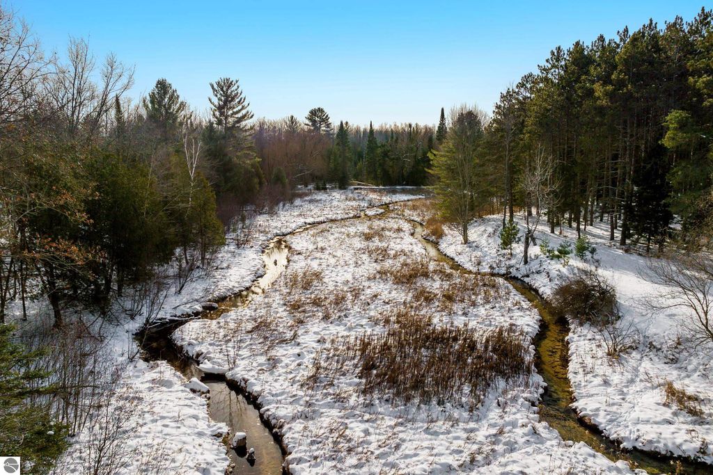 Image 4 of property listing at 5349 Grass River Road, Bellaire, MI 49615