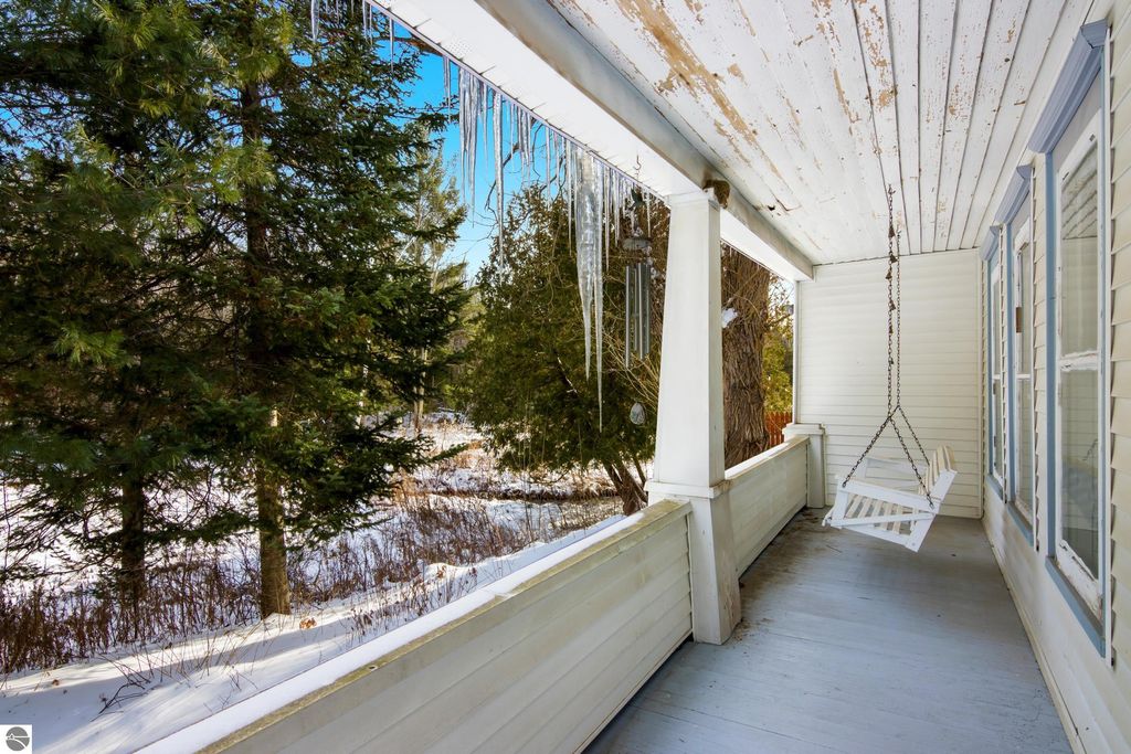 Image 8 of property listing at 5349 Grass River Road, Bellaire, MI 49615