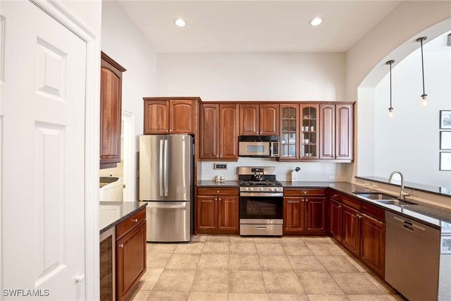 1821 Tarpon Bay DR S, Naples, FL 34119