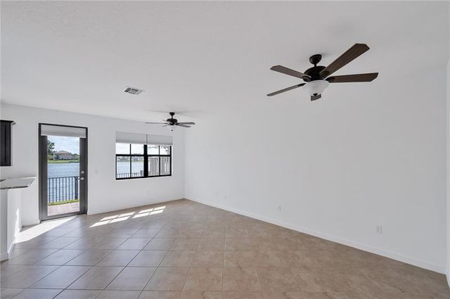 8448 Lake Majesty Lane, Parkland, FL 33076