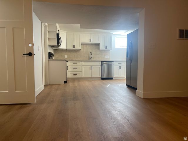 7157 S MEL HELEN WAY, West Jordan, UT 84084