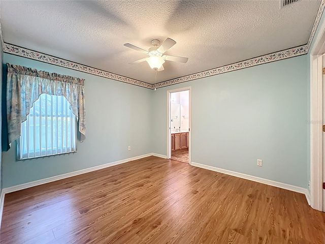 4822 SAWGRASS LAKE CIRCLE, Leesburg, FL 34748