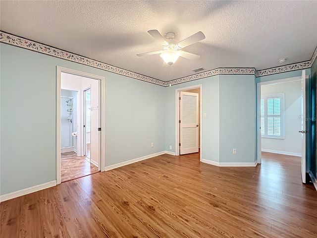 4822 SAWGRASS LAKE CIRCLE, Leesburg, FL 34748