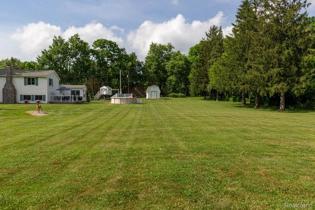 9026 Woodside Road, Salem Township, MI 48167